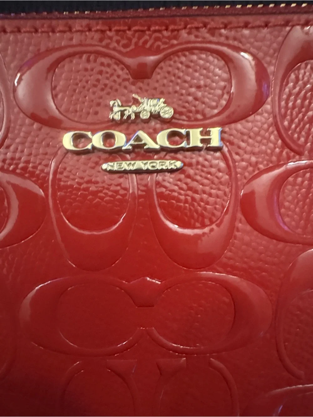 COACH Red Embossed Signature Wristlet with Gold Logo